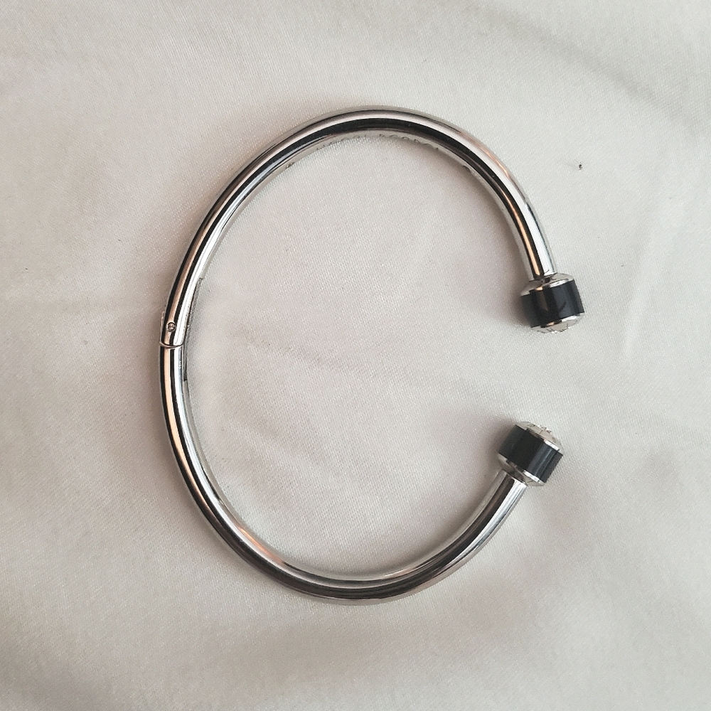 Sold ..Henri Bendel hinged bracelet